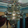 Chandelier in the Empire style with a metal frame and glass decorations from the castle in Kunin (after restoration)